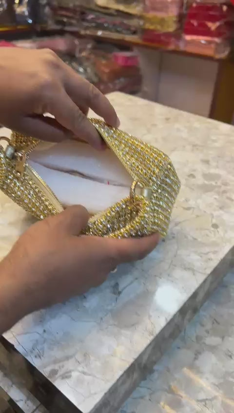 Sparkling gold party clutch bag for festive occasions